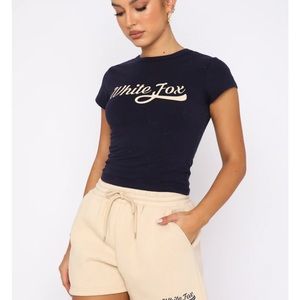 White fox moving different baby tee navy